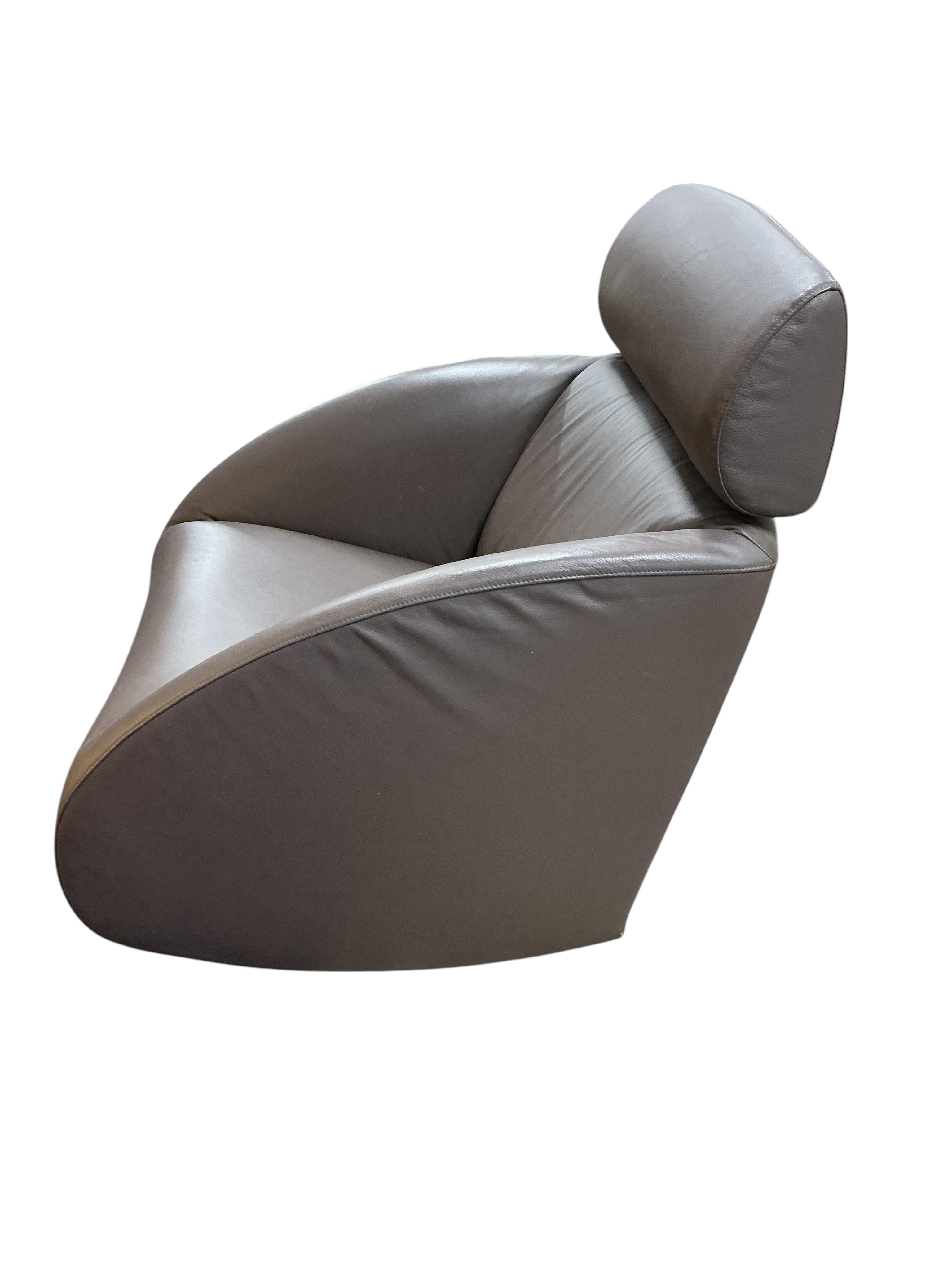 A Contemporary brown leather rocking chair, width 76cm, depth 88cm, height 90cm